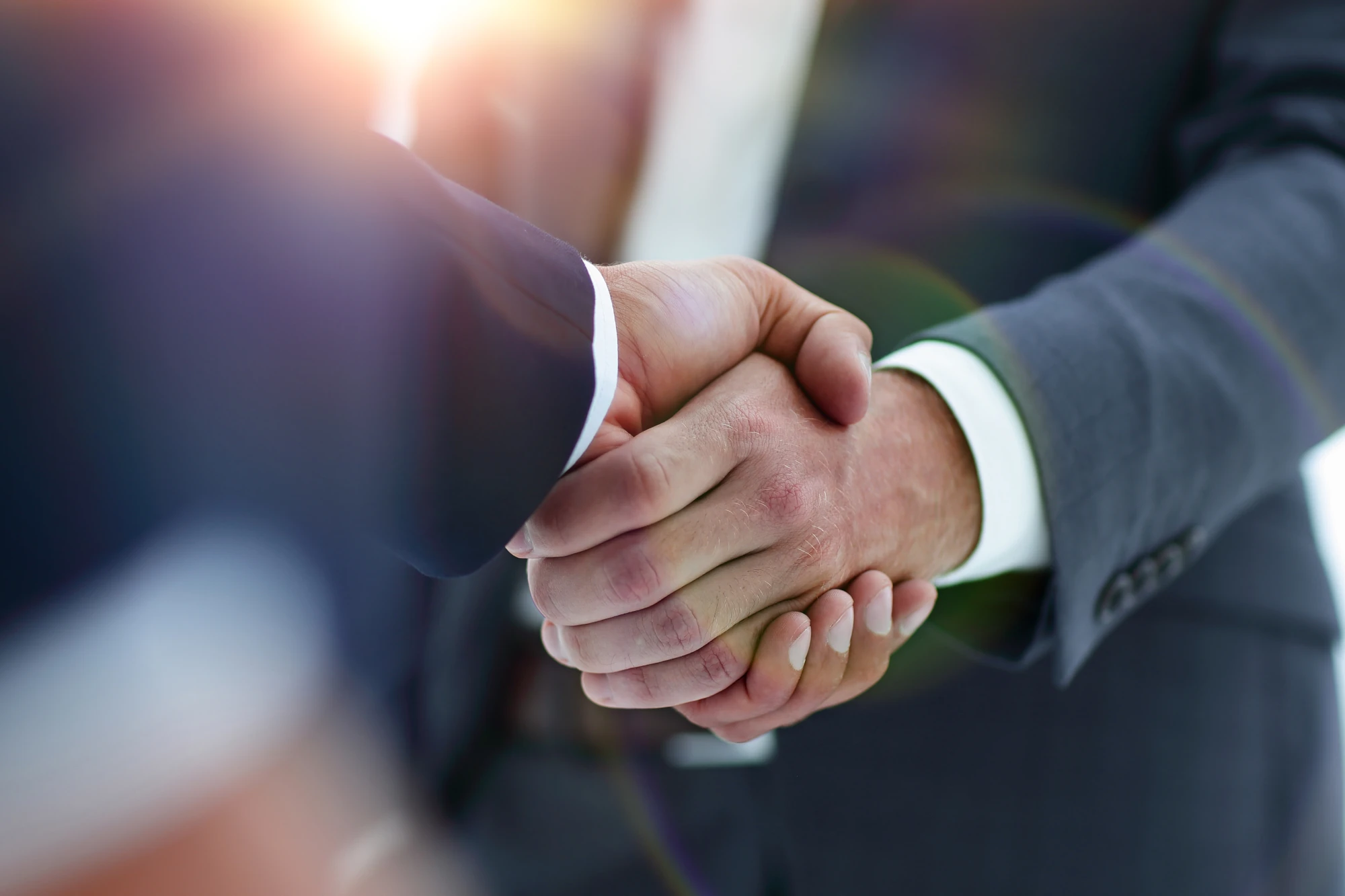 about-us-image2 Handshake